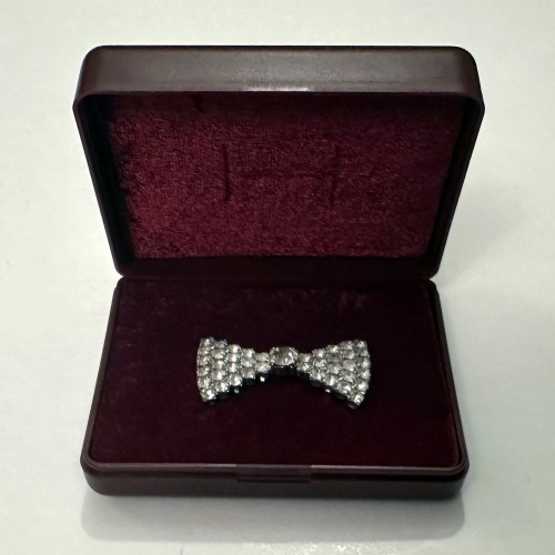 Silver colour 'diamond' studded brooch bow design jewellery in original box