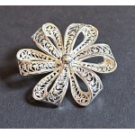 Silver colour ribbon design brooch costume jewelle...